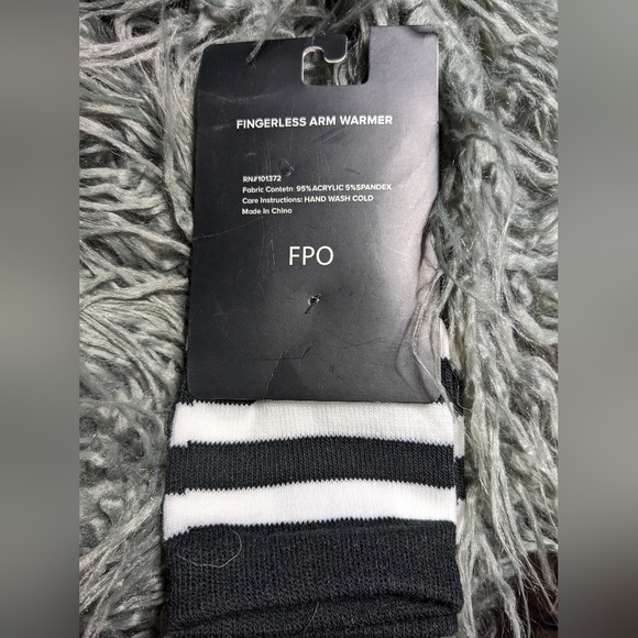 Fingerless arm warmers by Hot Topic. White and black. - Picture 2 of 3